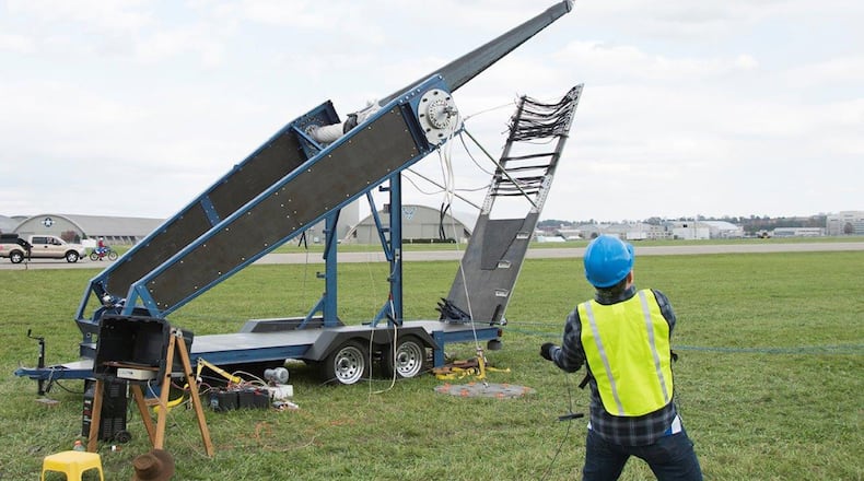 David Mollenhauer, Team ETHOS team captain, pulls the trigger on the Phoenix, launching a pumpkin 2,536 feet downrange in the team’s third attempt of the day at the 13th annual Wright-Patterson Air Force Base Pumpkin Chuck Oct. 27 behind the National Museum of the U.S. Air Force. Team ETHOS won the Class A competition with its first shot, which traveled 3,176 feet. (U.S. Air Force photo/R.J. Oriez)