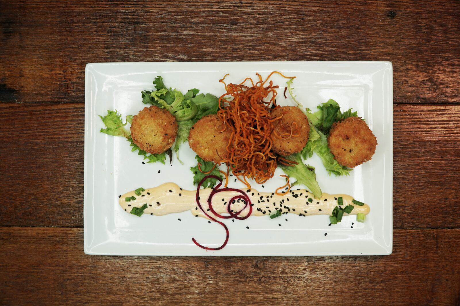 Basil's On Market's Risotto Tater Tots is a beloved dish here to stay. CONTRIBUTED