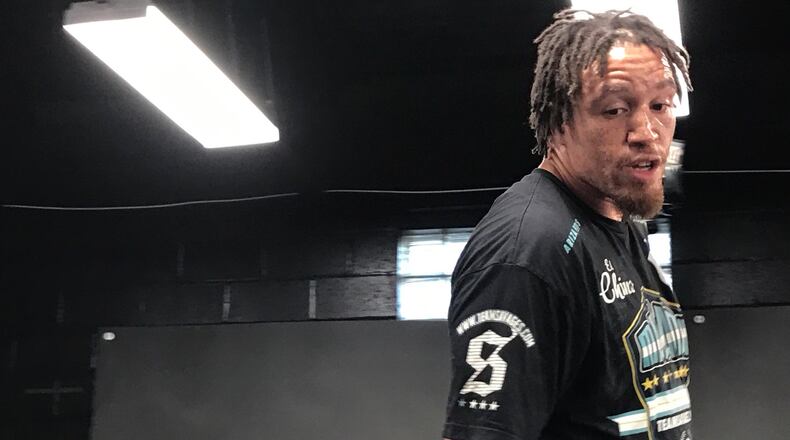 Derek Fields working out in the M-Power Gym in Vandalia. Tom Archdeacon/CONTRIBUTED