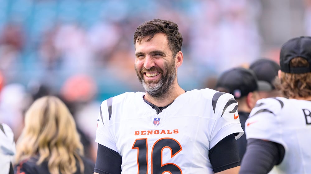 FILE - Cincinnati Bengals quarterback Joe Flacco (16) smiles on the sidelines during an NFL football game against the Miami Dolphins, Dec. 21, 2025, in Miami Gardens, Fla. (AP Photo/Doug Murray, File)