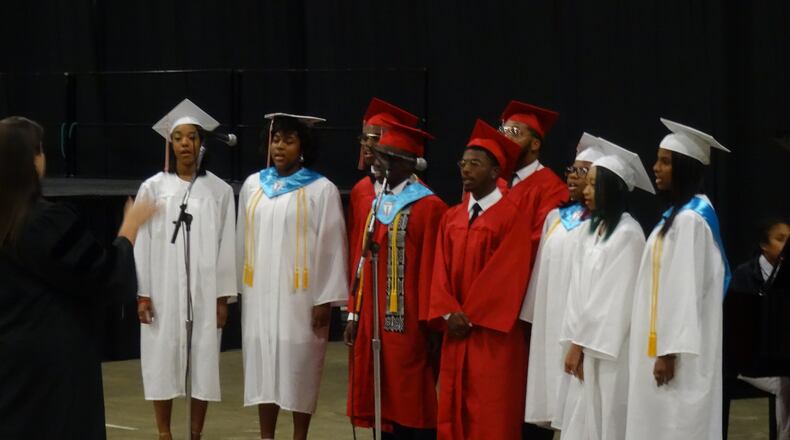 Students perform during the graduation ceremony for Trotwood-Madison High School at the Dayton Convention Center last year. CONTRIBUTED PHOTO