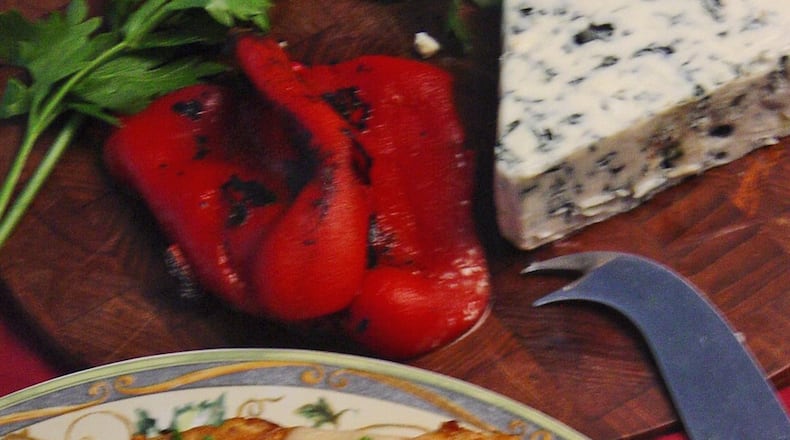 A domestic Gorgonzola works very well in this Chicken Gorgonzola recipe. You can find it crumbled, ready-to-use in the dairy case of the supermarket. (Linda Gassenheimer/TNS)