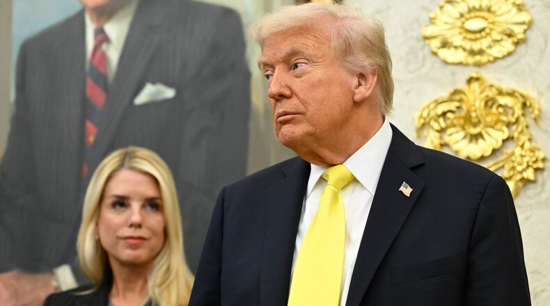 FILE - President Donald Trump and Attorney General Pam Bondi listen as FBI Director Kash Patel speaks during an event in the Oval Office at the White House, Oct. 15, 2025, in Washington. (AP Photo/John McDonnell, File)