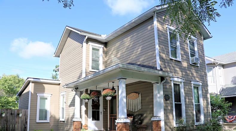 The frame 2-story has about 1,650 sq. ft. of living space with 3 or 4 bedrooms. The house is located along a tree-lined street and just a few houses down from the historic district’s round-about entrance. Concrete walkways lead from the sidewalk to the covered front porch. CONTRIBUTED PHOTO BY KATHY TYLER