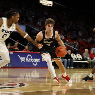 Miami’s Luke Skaljac (3) dribbles the ball against Akron on Saturday at Millett Hall. ELIJAH COOK / CONTRIBUTED