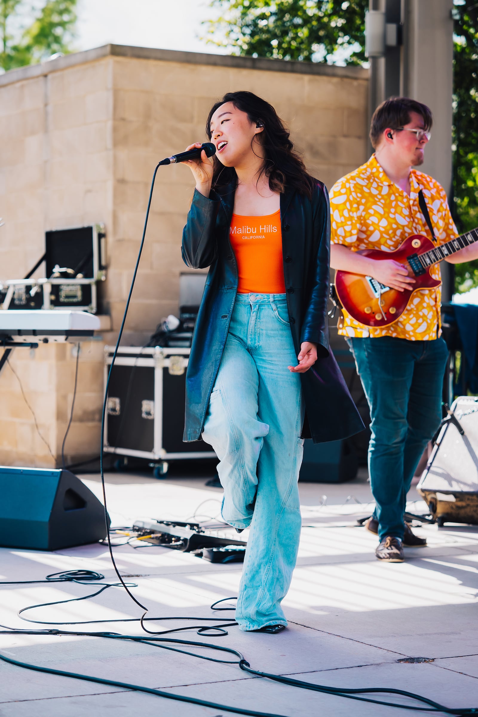 Serin Oh is a singer/songwriter and musician who is using her talents to bring people together. She is pursuing a career in ministry, following in her father's footsteps. She is shown performing at a show in Cincinnati in Washington Park in 2024. CONTRIBUTED