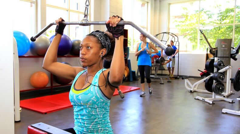 Adia Smith works out at Miami University’s Recreational Sports Center Monday, July 15, 2013. Miami University students give the college high marks, including in quality of life, according to a recent study by the Princeton Reviews annual best colleges guide. NICK DAGGY / STAFF