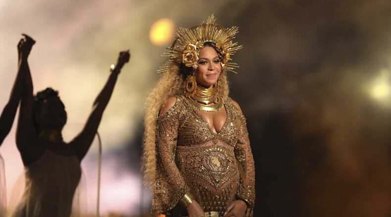 This Feb. 12, 2017 file photo shows Beyonce performing at the 59th annual Grammy Awards in Los Angeles. Beyonce is pregnant with twins. (Photo by Matt Sayles/Invision/AP, File)
