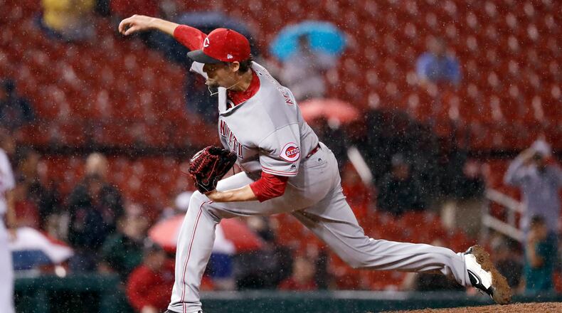Cincinnati Reds relief pitcher Deck McGuire throws during his major league debut in the eighth inning of a baseball game against the St. Louis Cardinals Tuesday, Sept. 12, 2017, in St. Louis. (AP Photo/Jeff Roberson)