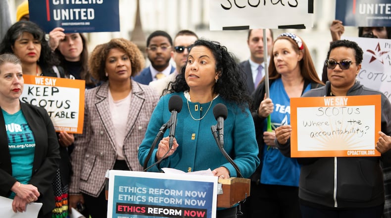 FILE - Analilia Mejia, center, speaks during a rally calling for SCOTUS ethics reform, May 2, 2023, in Washington. (Joy Asico/AP Images for Center for Popular Democracy Action, File)