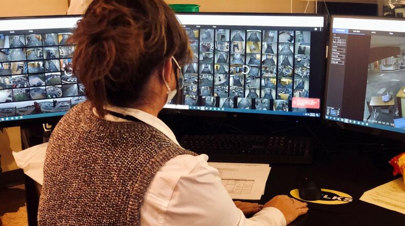 A Centerville staff member looks at security cameras at one of Centerville School's buildings. Courtesy of Centerville City Schools.