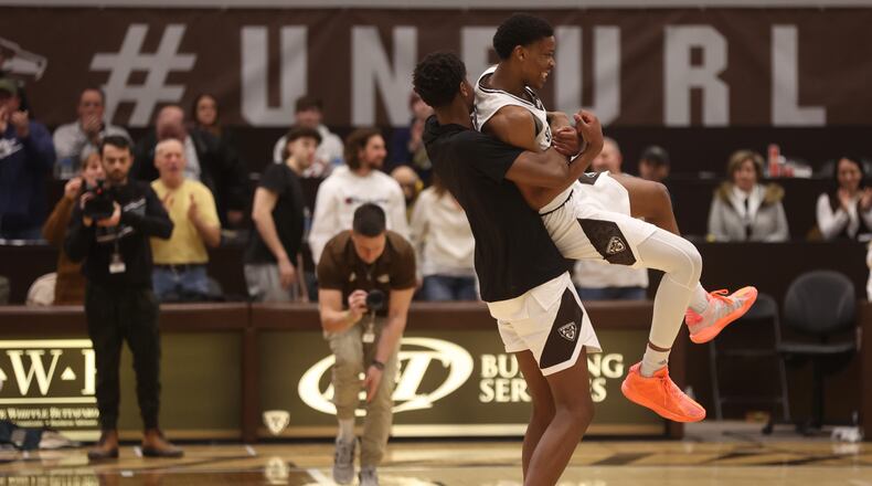 St. Bonaventure celebrates a victory against Dayton on Saturday, Feb. 4, 2023, at the Reilly Center in St. Bonaventure, N.Y. David Jablonski/Staff
