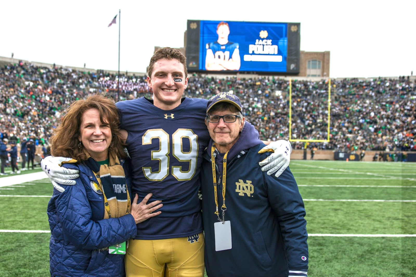 Andrew Yanoshak, with his mom, Claire, and dad, Steve, on Senior Day at Notre Dame last season. After spending four years in the Irish football program as a tight end, and getting his undergrad degree, Yanoshak transferred to the University of Dayton this season and has switched back to his old high school position – defensive end – which he’ll play for the Flyers this season while pursuing his MBA at UD. CONTRIBUTED PHOTO