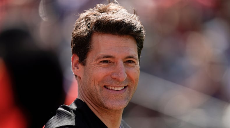 FILE - Tony Dokoupil, co-host of "CBS This Morning", looks on before throwing a ceremonial first pitch prior to a baseball game between the Baltimore Orioles and the Texas Rangers, May 27, 2023, in Baltimore. (AP Photo/Julio Cortez, File)