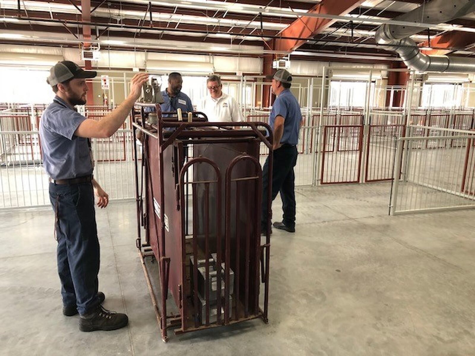 Montgomery County Auditor Karl Keith observing the certification of the livestock scales at the new Montgomery County Fairgrounds. (GABRIELLE ENRIGHT/STAFF PHOTO)