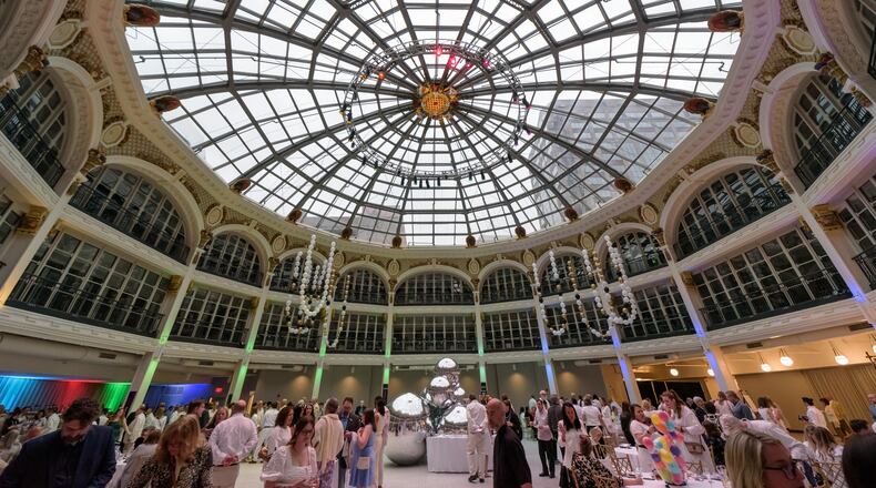 The Contemporary Dayton celebrated the 30th anniversary of its annual art auction in the Dayton Arcade’s rotunda and The Contemporary’s galleries on Friday, Apr. 26, 2024. Over 80 local artists donated their work which included paintings, photography, prints and sculptures to The Co’s signature fundraiser for attendees to browse, bid and buy. Proceeds directly fund future exhibitions and education programs. TOM GILLIAM / CONTRIBUTING PHOTOGRAPHER