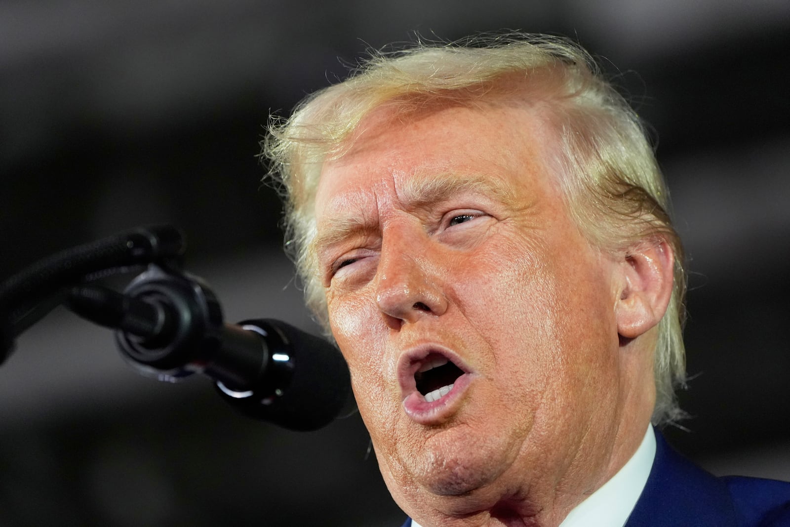 President Donald Trump speaks on his first 100 days at Macomb County Community College Sports Expo Center, Tuesday, April 29, 2025, in Warren, Mich. (AP Photo/Alex Brandon)