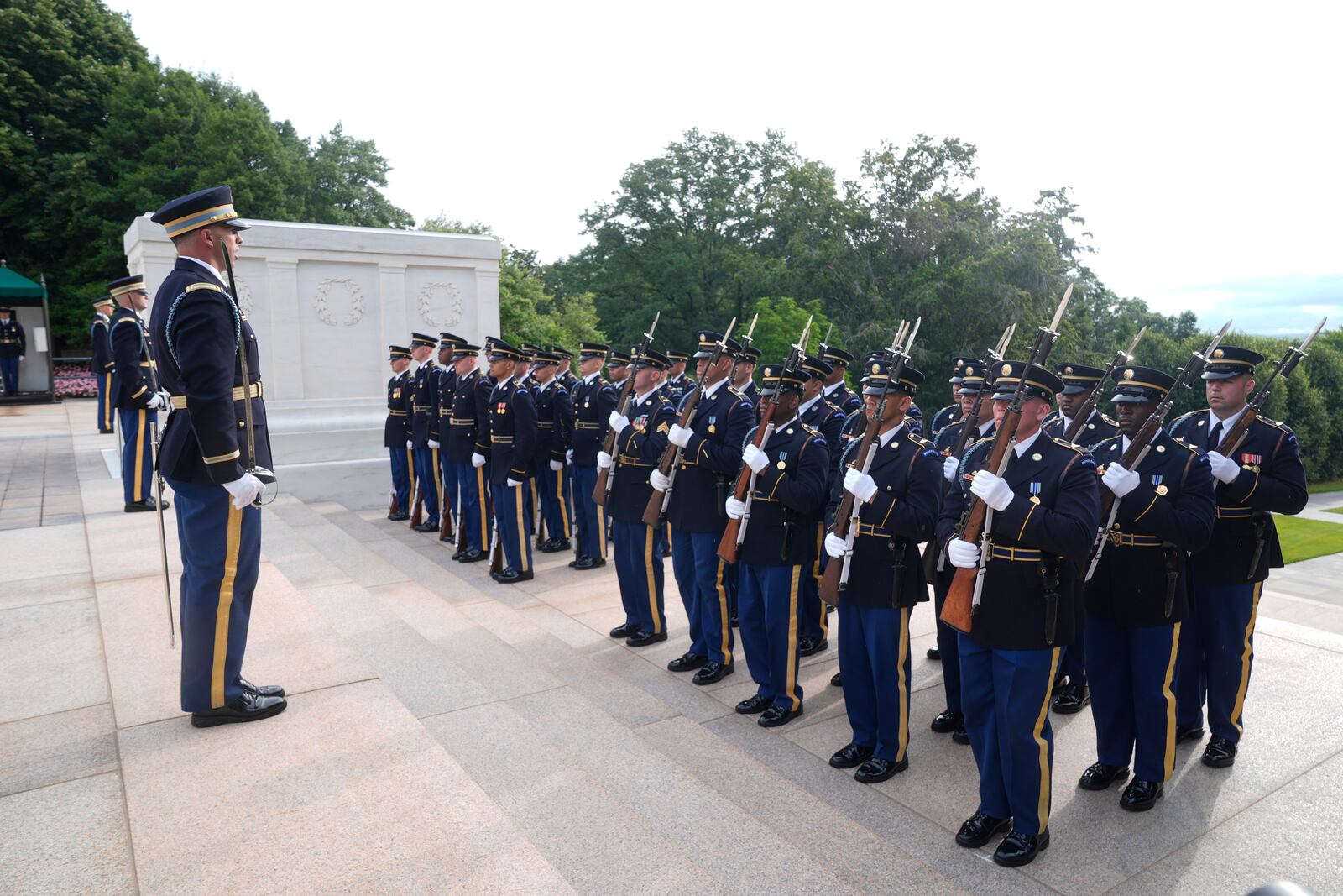 Soldiers prepare ahead of wreath laying ceremony at the Tomb of the Unknown Soldier at Arlington National Cemetery, honoring the Army's 250th anniversary and coinciding with President Donald Trump's 79th birthday, Saturday, June 14, 2025, in Arlington, Va. (AP Photo/Manuel Balce Ceneta)