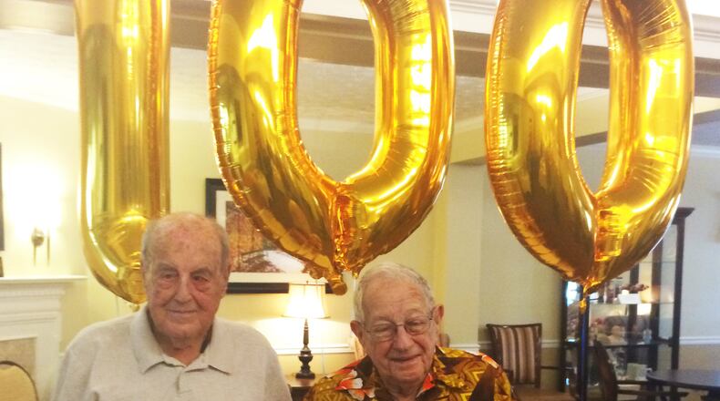 WWII veterans Russ Taylor (left) and Ken Snavely at Snavely’s 100th birthday party July 24 at Brookdale Miami Twp. Taylor will turn 100 Oct. 2. CONTRIBUTED
