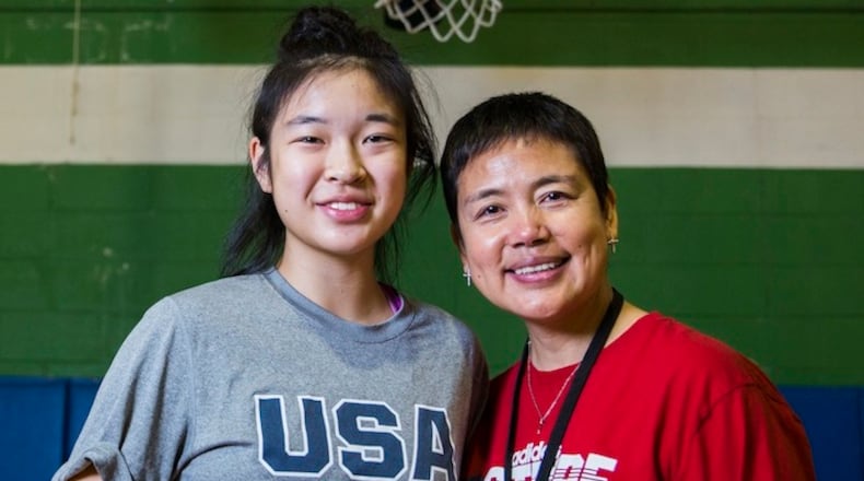 Plano West Senior High School basketball player Natalie Chou and her mother, Quanli Li, on January 13, 2016, at Q D Recreation Academy in Plano, Texas. (Ashley Landis/Dallas Morning News/TNS)