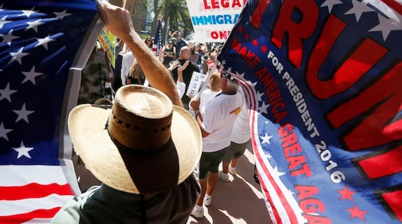About 100 of Donald Trump's Latino supporters rally outside Anaheim City Hall on Sunday, Aug. 28, 2016. (Luis Sinco/Los Angeles Times/TNS)