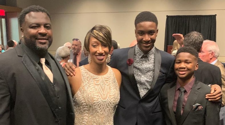 David Martin (left; Kameisha’s husband and former NFL tight end), Kameisha, and sons Darius and Devyn. CONTRIBUTED PHOTO