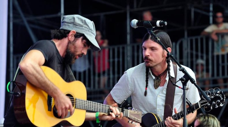 Seth and Scott Avett of the Avett Brothers get hot playing the final day of the Bonnaroo Music & Arts Festival on June 15, in Manchester, Tenn.
