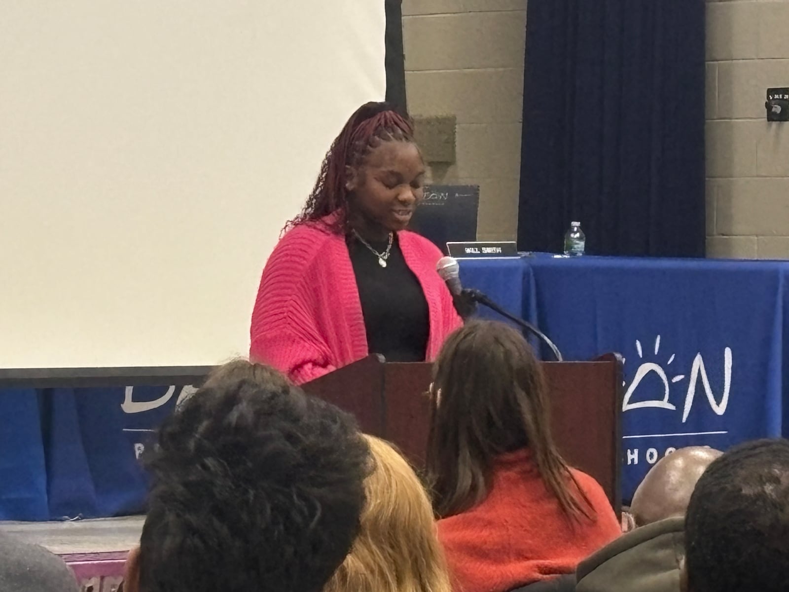 Student board of education member Nevaeh Woods speaks at a recent Dayton Public Schools board of education meeting honoring member Karen Wick-Gagnet, who died on Dec. 6. Eileen McClory / staff