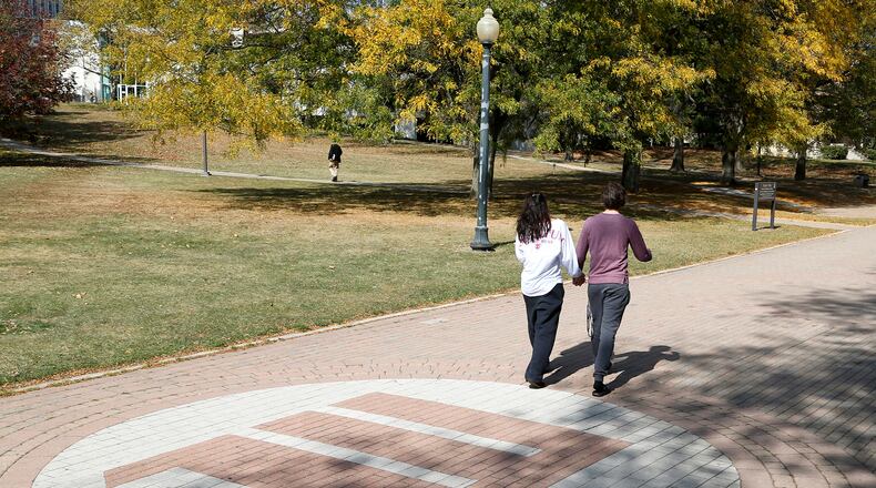 Students walk across campus at the Wittenberg University. Bill Lackey/Staff