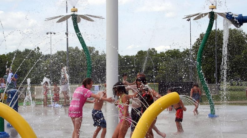 The sprayground at Activity Center Park off North Main Street in Centerville allows children of all ages to have fun getting wet in hot weather. The popular attraction is set to get a $475,000 upgrade in 2024, with Dayton Children's Hospital donating $150,000 toward the renovations. STAFF FILE PHOTO