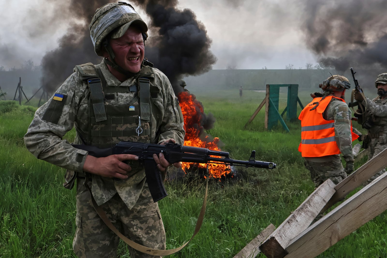 In this photo provided by Ukraine's 65th Mechanized Brigade press service, Ukrainian servicemen attend a military training in Zaporizhzhia region, Ukraine, Monday, May 26, 2025. (Andriy Andriyenko/Ukraine's 65th Mechanized Brigade via AP)
