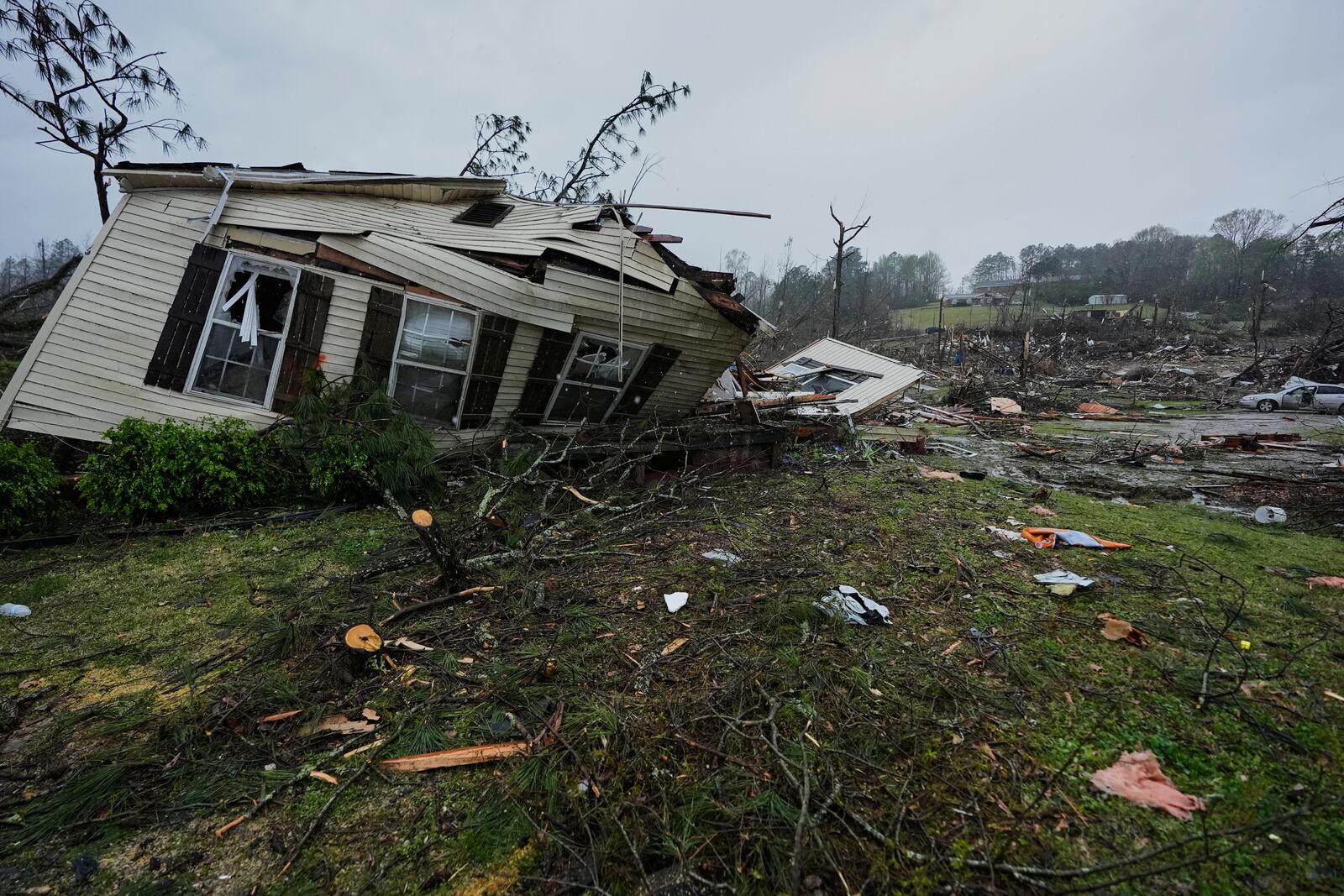 A storm damaged home is seen Thursday, April 3, 2025, in Selmer, Tenn. (AP Photo/George Walker IV)