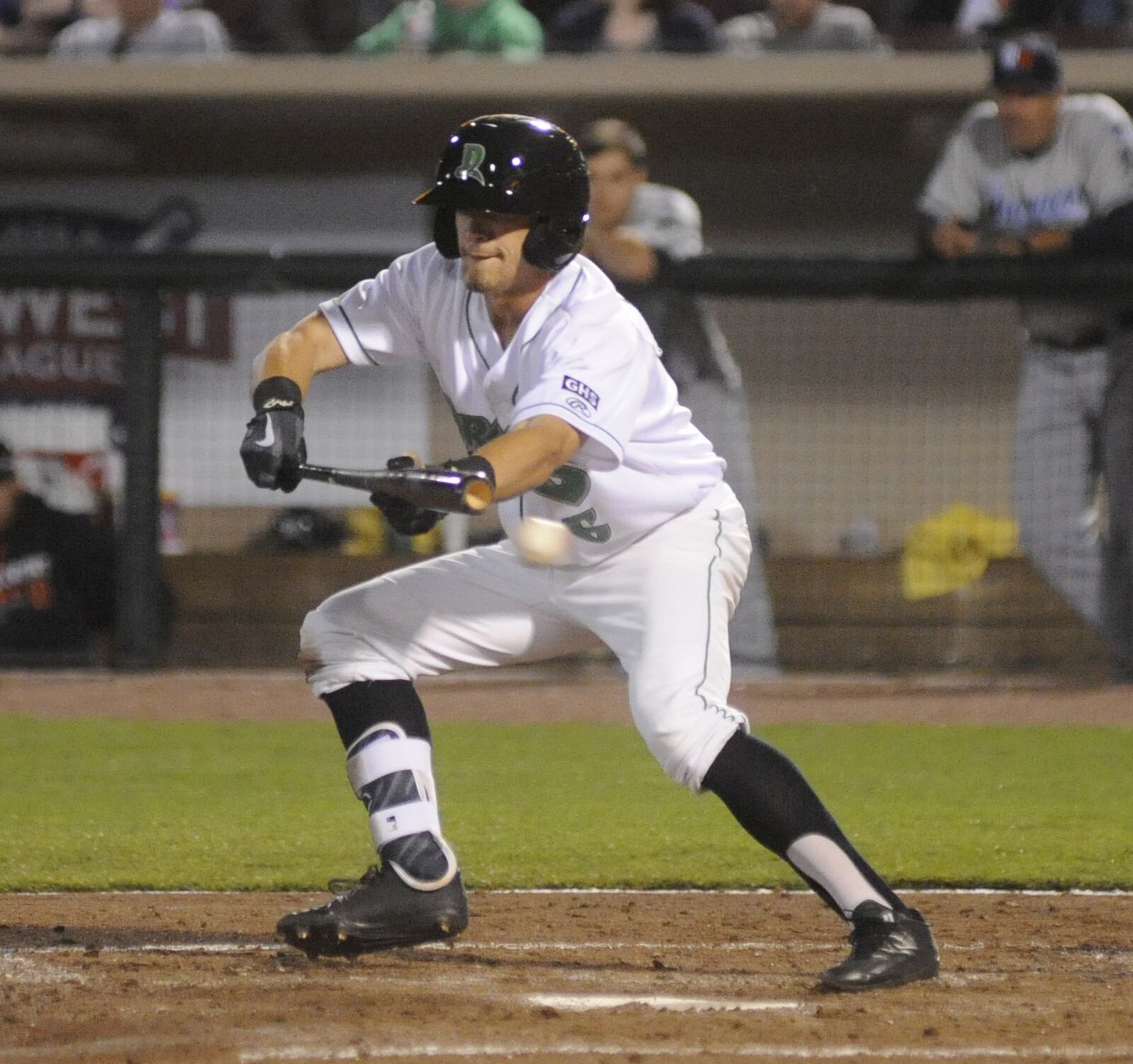 Dragons outfielder T.J. Friedl misses a bunt attempt. The Dragons defeated the visiting West Michigan Whitecaps (Tigers) 2-0 in a Class A minor-league baseball game at Dayton’s Fifth Third Field on Monday, April 10, 2017. MARC PENDLETON / STAFF