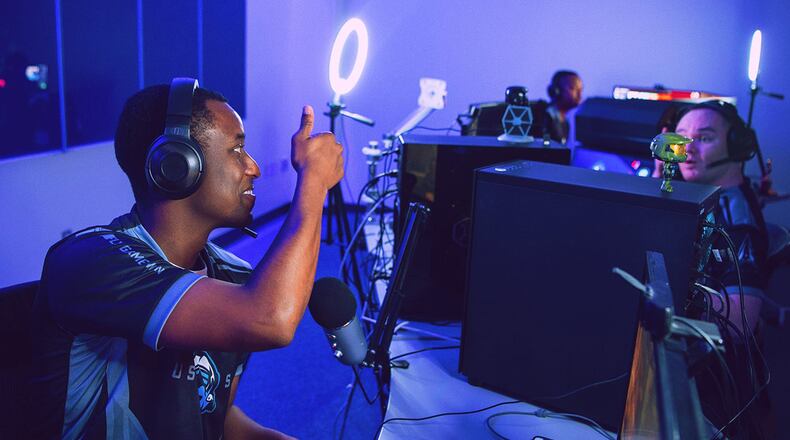 Tech. Sgt. Maurice Moyer, team captain for the Department of the Air Force Gaming Space Force team, gives a thumbs up to one of his teammates during a DAFG Season 1 tournament. Air Force launched the gaming league in 2020 to foster resiliency and retention through global e-sports events that bring Airmen and Guardians together in competitive leagues. Registration for the new season is open and closes Sept. 1. CONTRIBUTED PHOTO