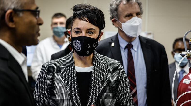 Dr. Sakthi Subburayalu, left, talks with U.S.D.A. Deputy Secretary Jewel Bronaugh and Ohio Sen. Sherrod Brown during a tour of Central State University Thursday April, 14 2022. JIM NOELKER/STAFF
