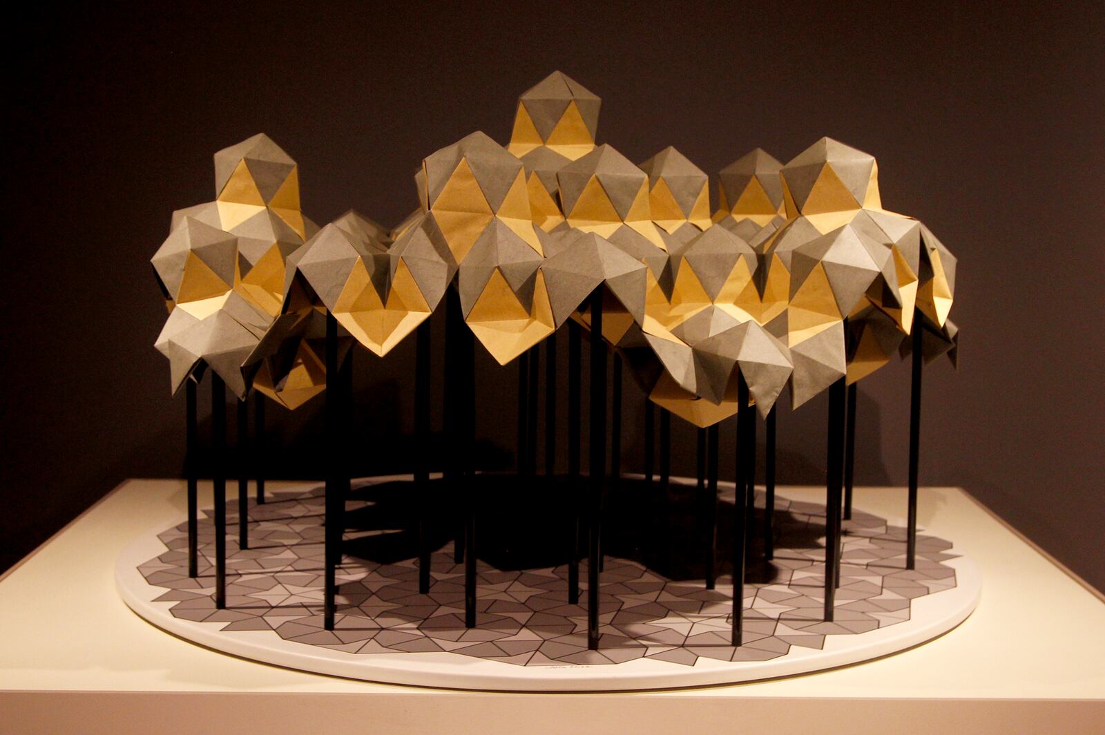 "Pentasia," by artist Robert Long is one of the pieces in the Dayton Art Institute origami exhibit, A“Above the Fold: New Expressions in Origami” . It is made with 500 squares of paper. LISA POWELL / STAFF