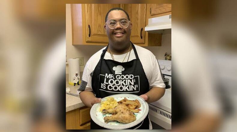 Adam Flowers shows off his creation from the Healthy Habits Cook Club. CONTRIBUTED