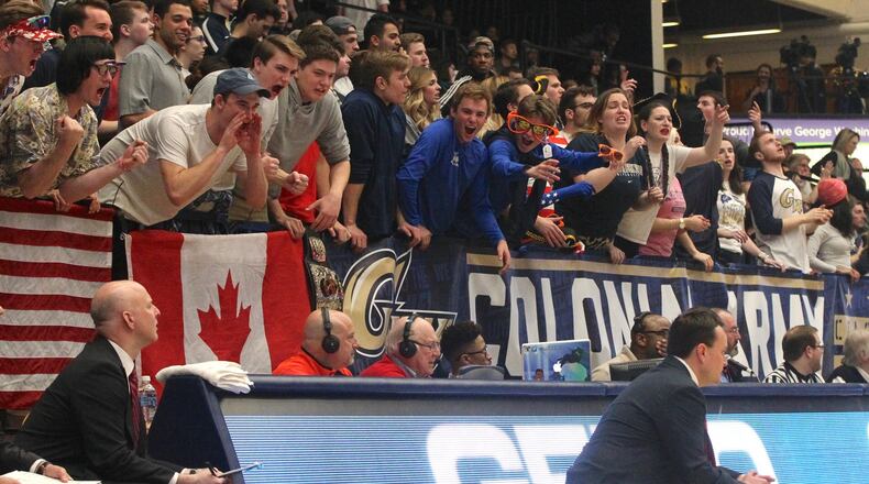 George Washington fans yell at Dayton coach Archie Miller on Saturday, March 4, 2017, at the Smith Center in Washington, D.C. David Jablonski/Staff