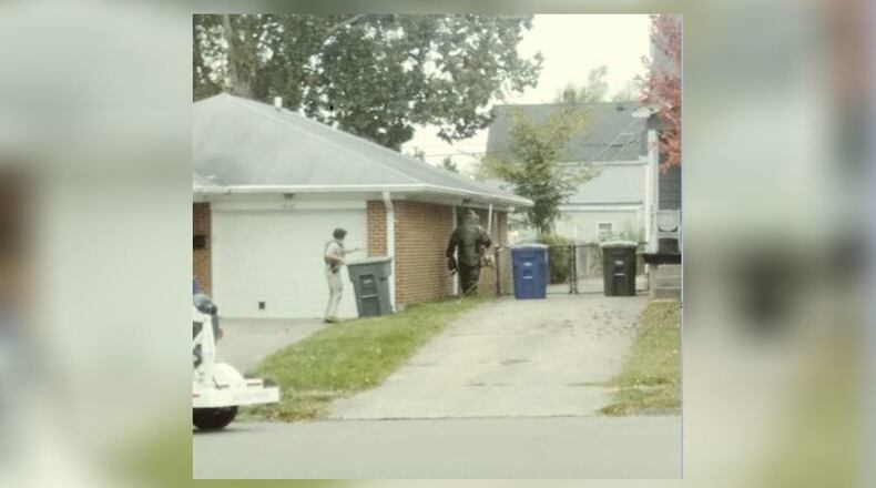 The Dayton Bomb Squad set off two explosions Friday afternoon during their investigation of a suspicious device found at a residence on Rosemont Boulevard. (Courtesy/Justin Lundberg)