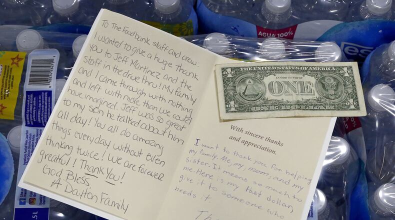 Card received by The Foodbank after assisting a family affected by tornado damage in Dayton last week.  TY GREENLEES / STAFF