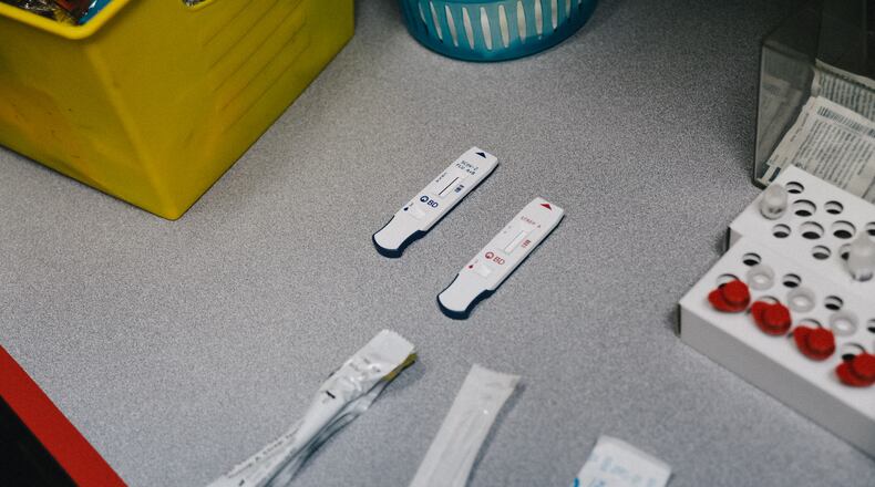FILE — COVID-19 and flu tests are prepped for a patient at a health center in Oregon City, Ore., March 23, 2023. (Mason Trinca/The New York Times)