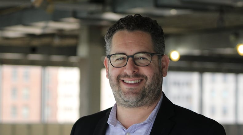 Michael Matthews, vice president of leasing with Canadian firm Olymbec, says his company is looking at buying more office properties downtown. The company owns 111 W. First St., which is where Taylor Communications will move hundreds of employees. CORNELIUS FROLIK / STAFF