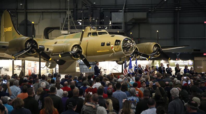 The National Museum of the U.S. Air Force opened the Memphis Belle exhibit to the public on Thursday after a 13-year restoration. Staff and volunteers worked 55,000 hours to restore the iconic World War II bomber. TY GREENLEES / STAFF