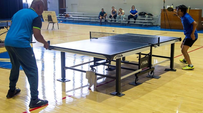 Ren Murakami (right), an Air Force Institute of Technology intern, and Louis Vance, 88th Mission Support Group deputy director, face off in the Ping-Pong tournament finals Aug. 11 at Wright Field Fitness Center. Murakami went on to win the title. U.S. AIR FORCE PHOTO/AIRMAN 1ST CLASS JAMES JOHNSON