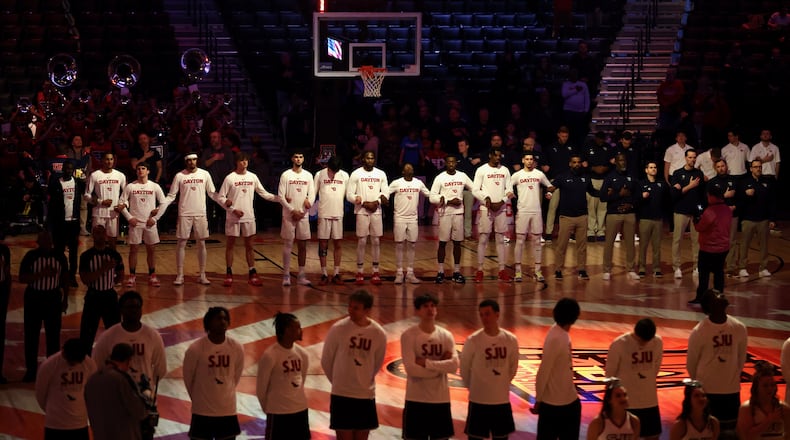 Dayton stands for the national anthem before a game against Saint Joseph’s in the quarterfinals of the Atlantic 10 Conference tournament on Thursday, March 9, 2023, at the Barclays Center in Brooklyn, N.Y. David Jablonski/Staff