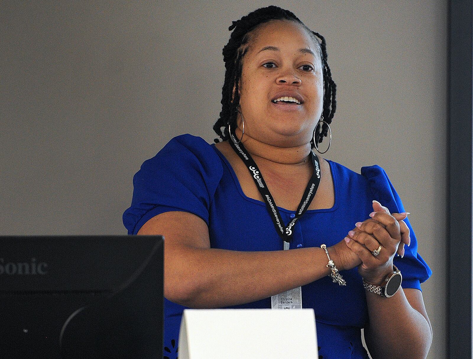Chrissy Sanders, chief financial officer and director of business operations at Montgomery County Alcohol, Drug Addiction and Mental Health Services (ADAMHS), talks during an informational meeting on June 14, 2024, regarding changes in the board's funding cycle for providers of services for mental health and substance use disorders. MARSHALL GORBY\STAFF