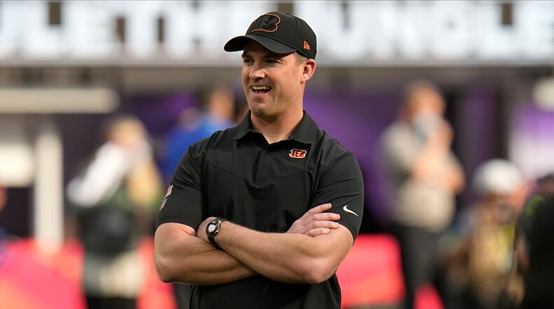 Cincinnati Bengals head coach Zac Taylor watches warmups before the NFL Super Bowl 56 football game against the Los Angeles Rams, Sunday, Feb. 13, 2022, in Inglewood, Calif. (AP Photo/Chris O'Meara)