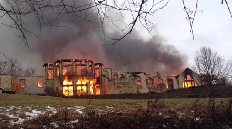 More than 80 firefighters worked Jan. 10, 2014, to put out the blaze that swallowed a 10,000-square-foot residence in Indian Hill. BRYCE ANSLINGER/WCPO