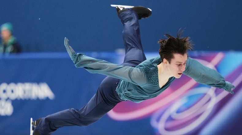 Kyrylo Marsak of Ukraine competes during the men's figure skating short program at the 2026 Winter Olympics, in Milan, Italy, Tuesday, Feb. 10, 2026. (AP Photo/Francisco Seco)