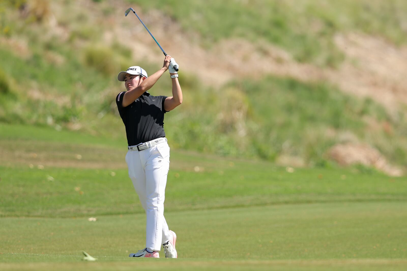 Akie Iwai hits from the seventh fairway during the final round of the LPGA's JM Eagle LA Championship golf tournament at El Caballero Country Club Sunday, April 20, 2025, in Los Angeles. (AP Photo/Jessie Alcheh)